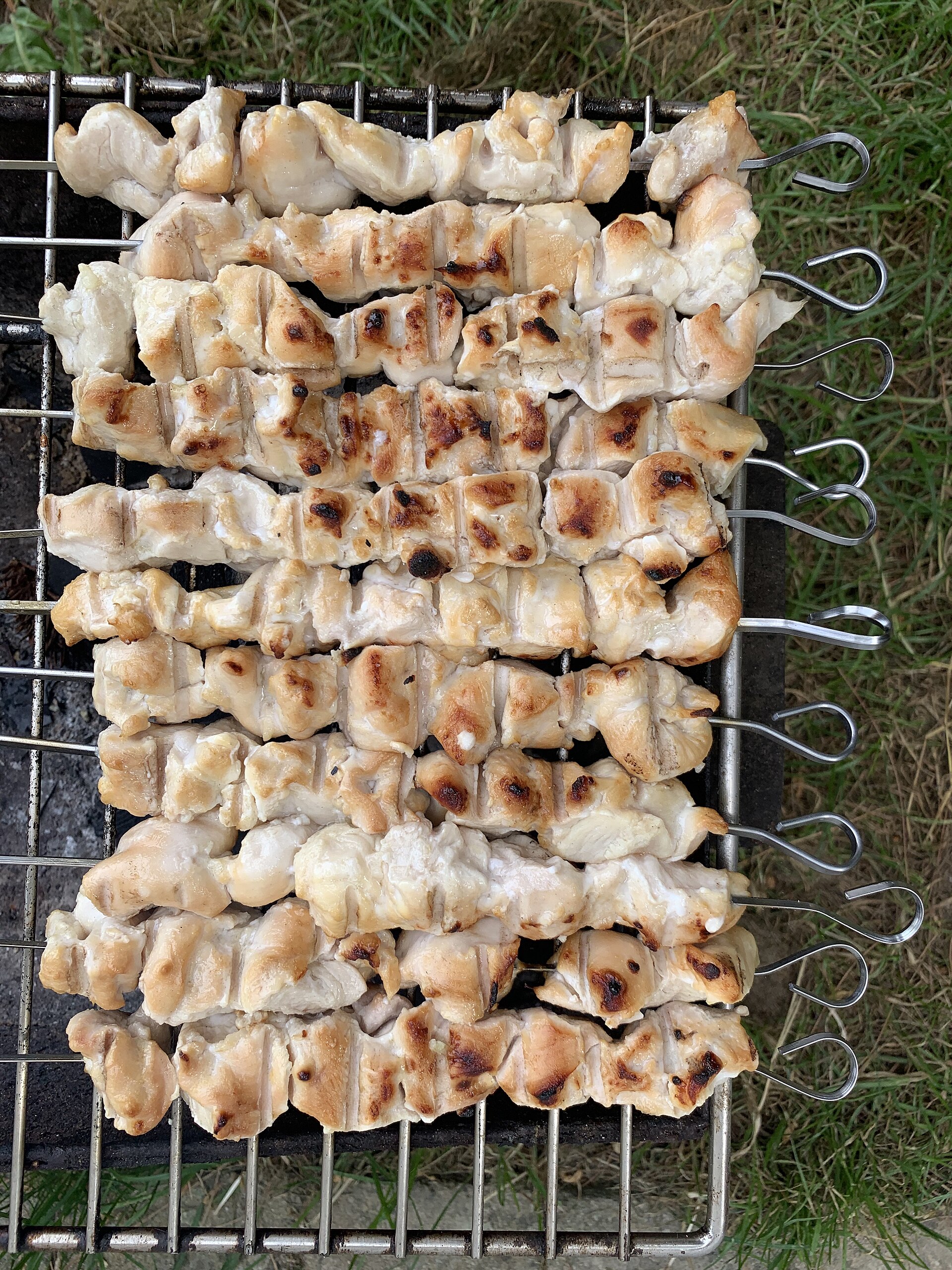 Chicken skewers on a barbecue